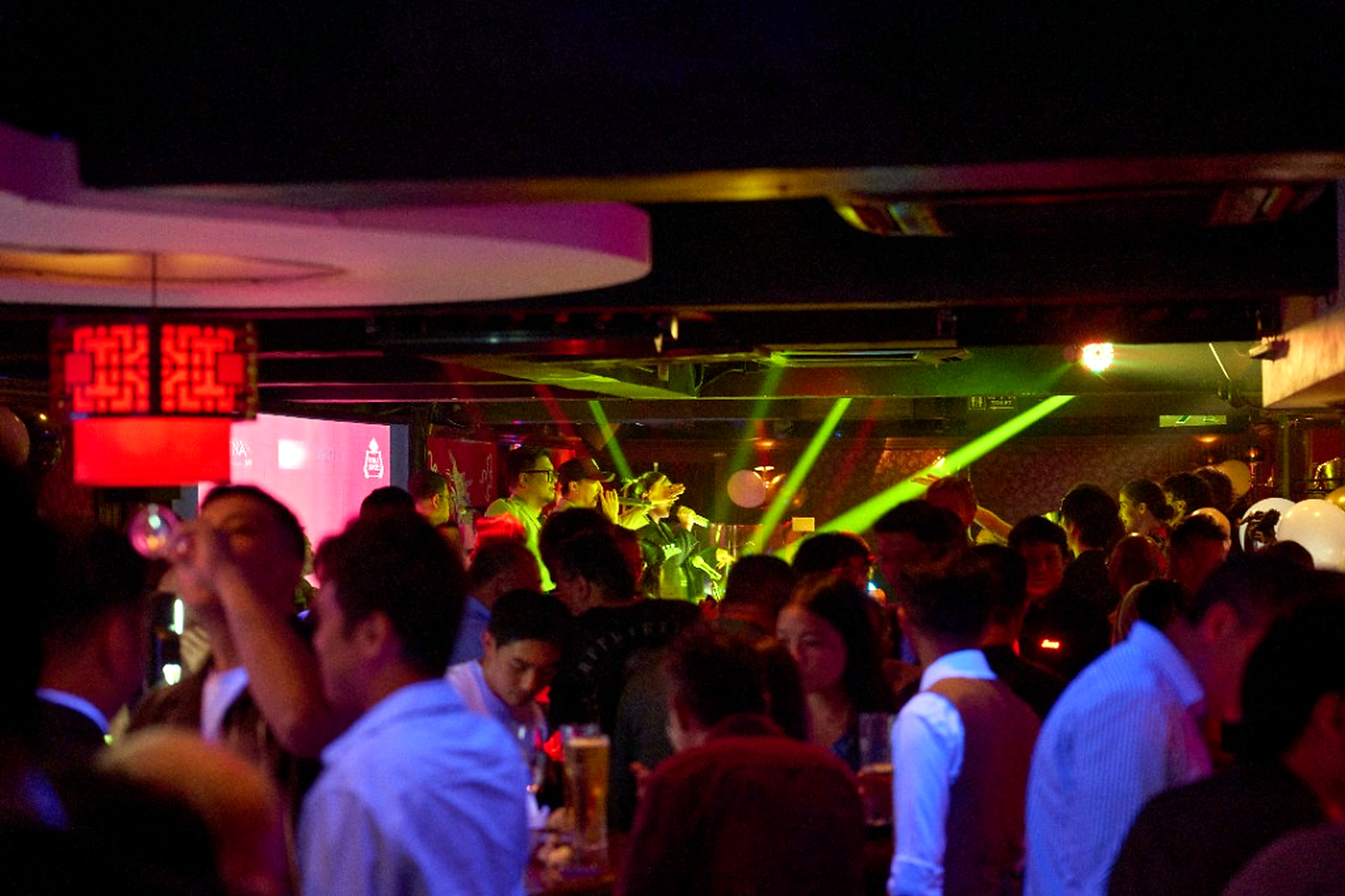 Crowd and live music at The China Bar Lan Kwai Fong