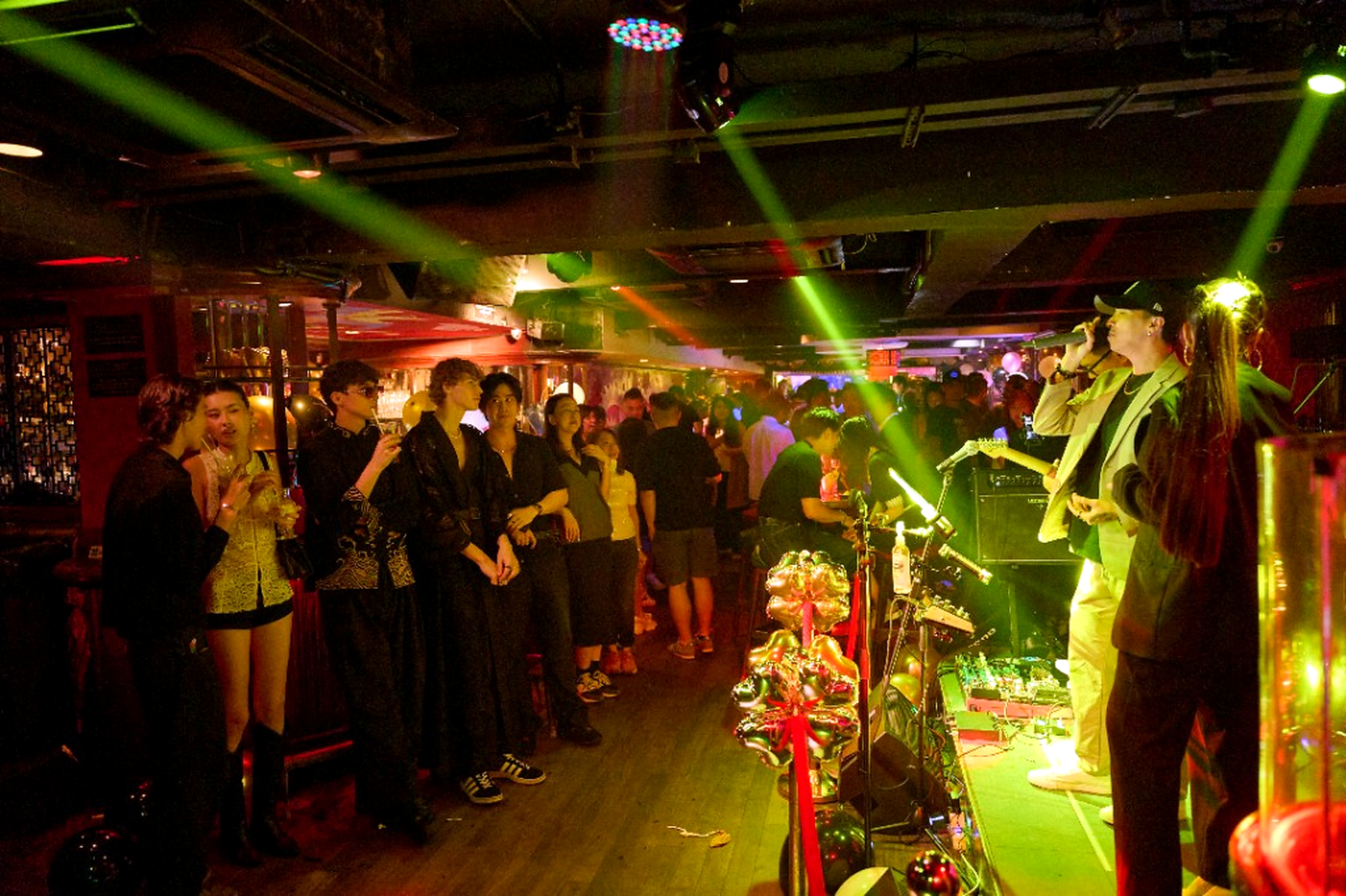 Live performance and crowd at The China Bar Lan Kwai Fong